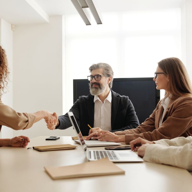 Two people in a client meeting