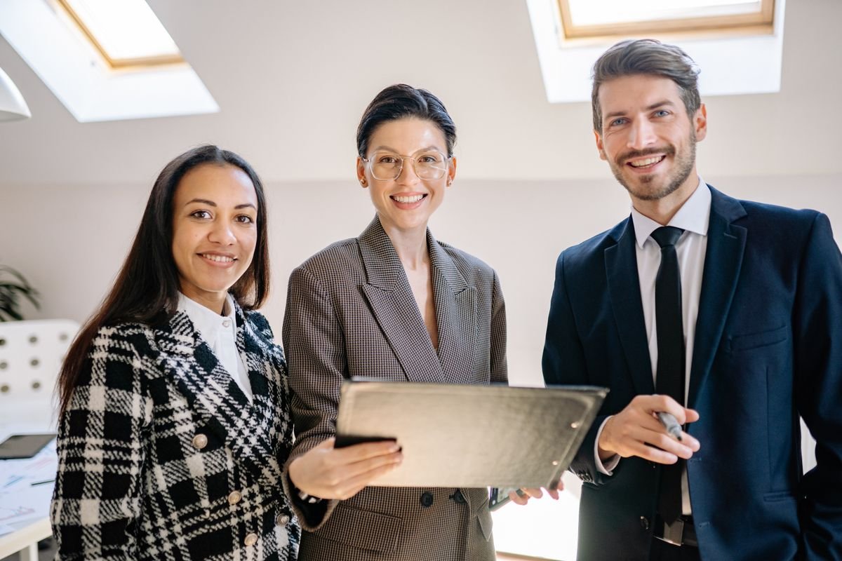 An organisation team collaborating in the office