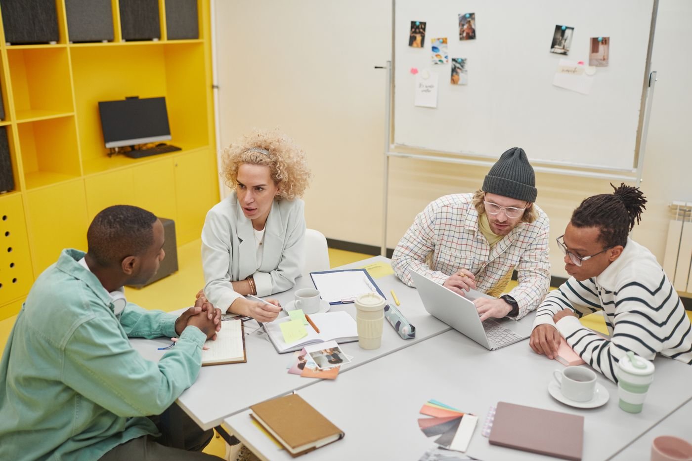 A facilitator leading a session with a small team