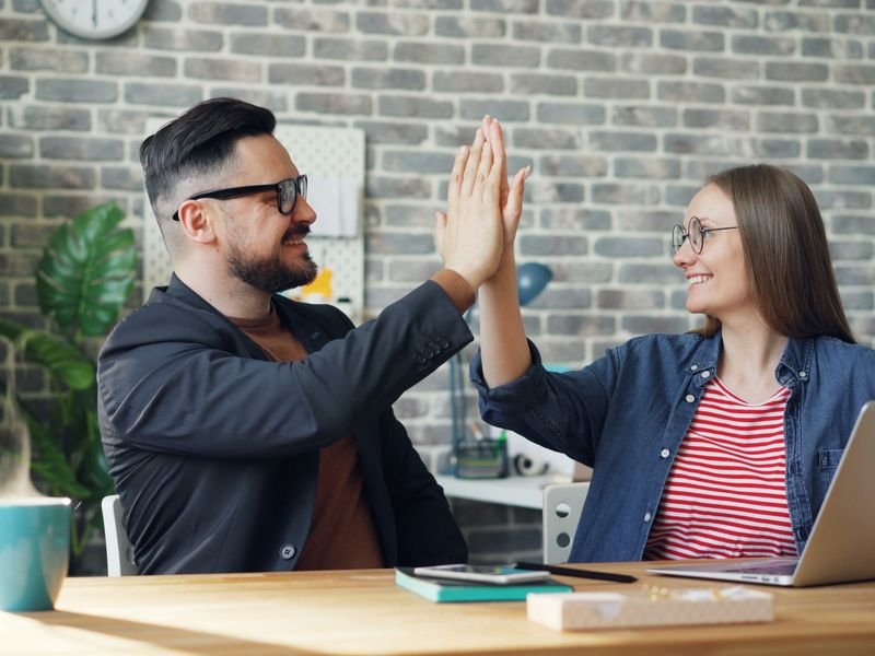 Colleagues sharing a moment of agreement
